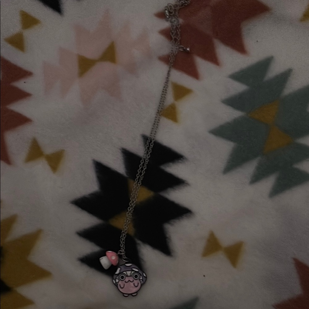 Elegant Pink and Silver Necklace with Intricate Pendant